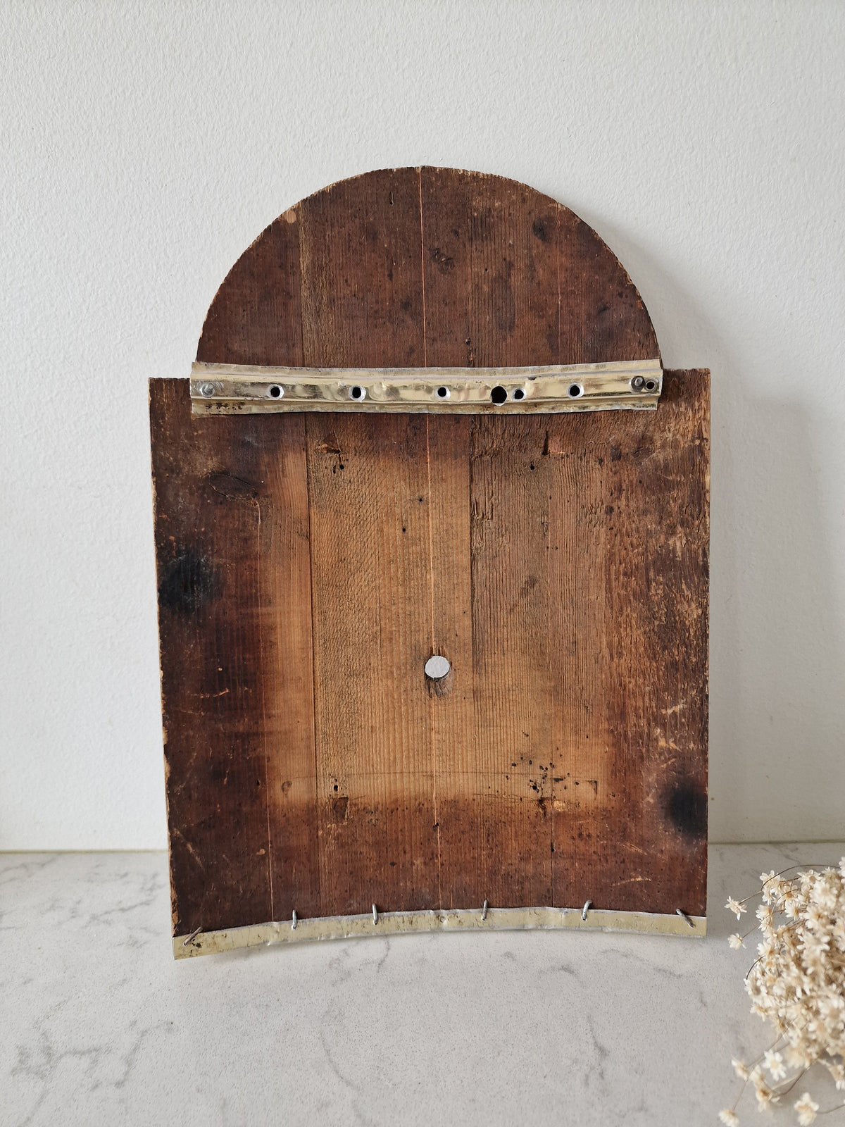 Old wooden clock face