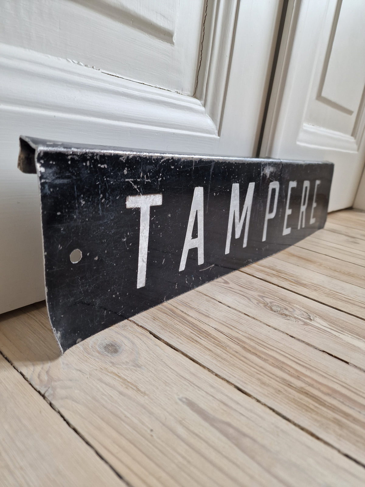 Vanha patinoitunut kyltti, Tampere