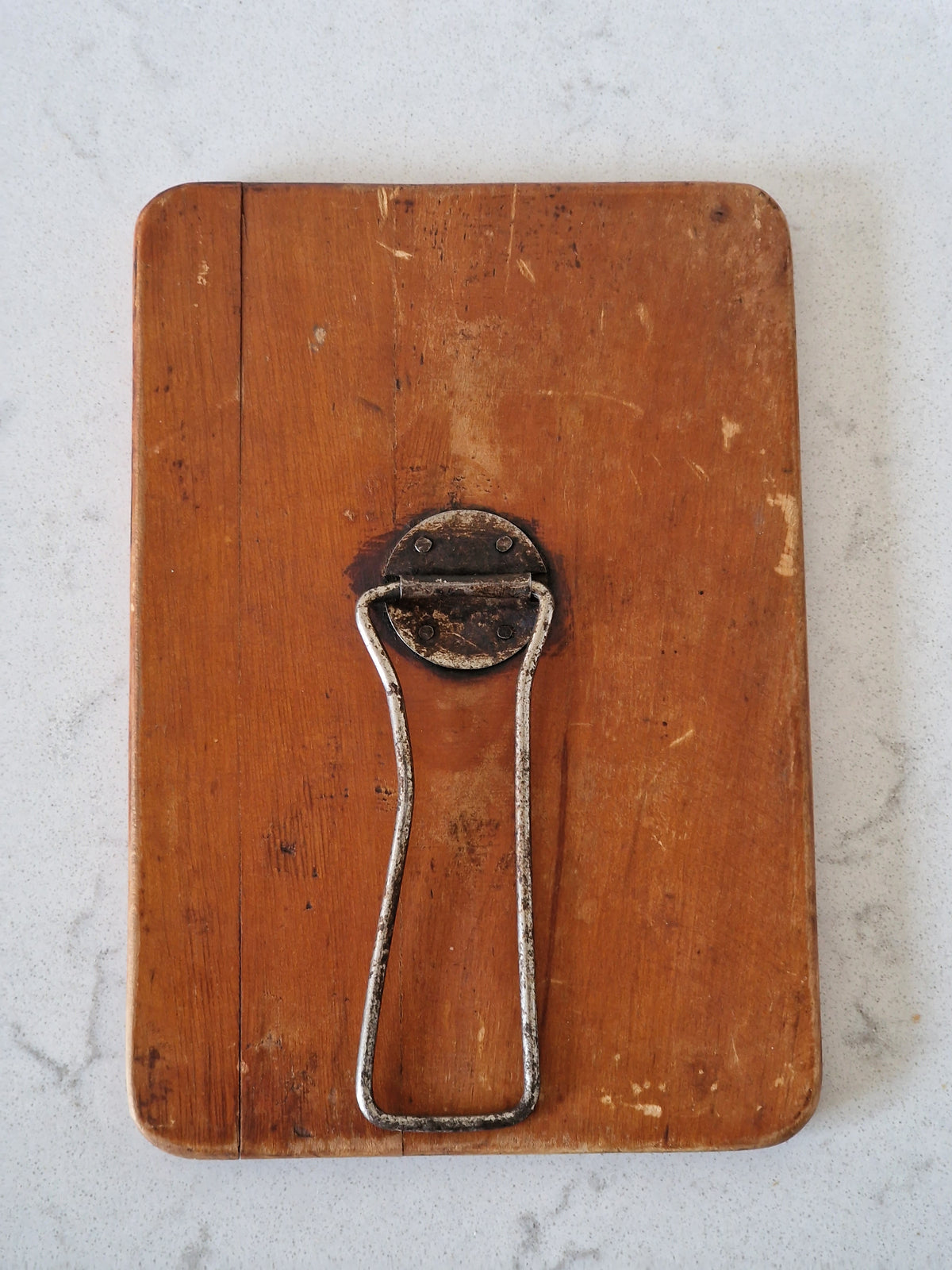 An old mirror with a wooden frame