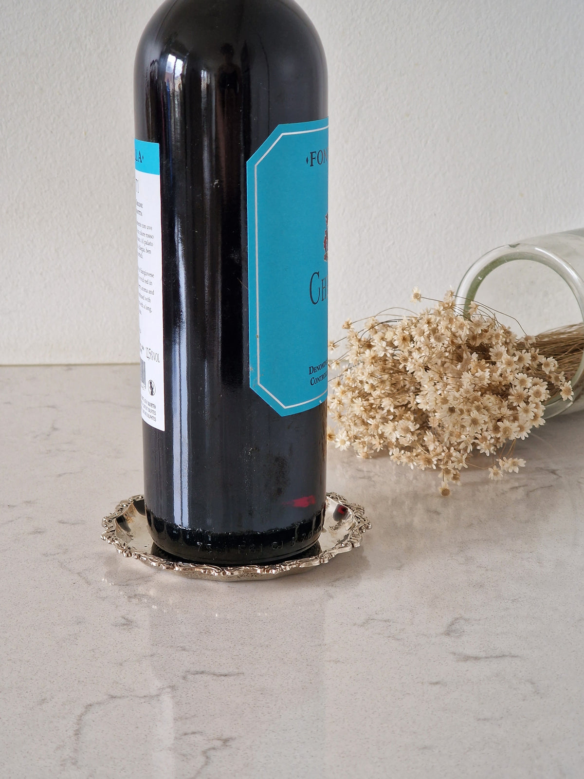Wine bottle coaster