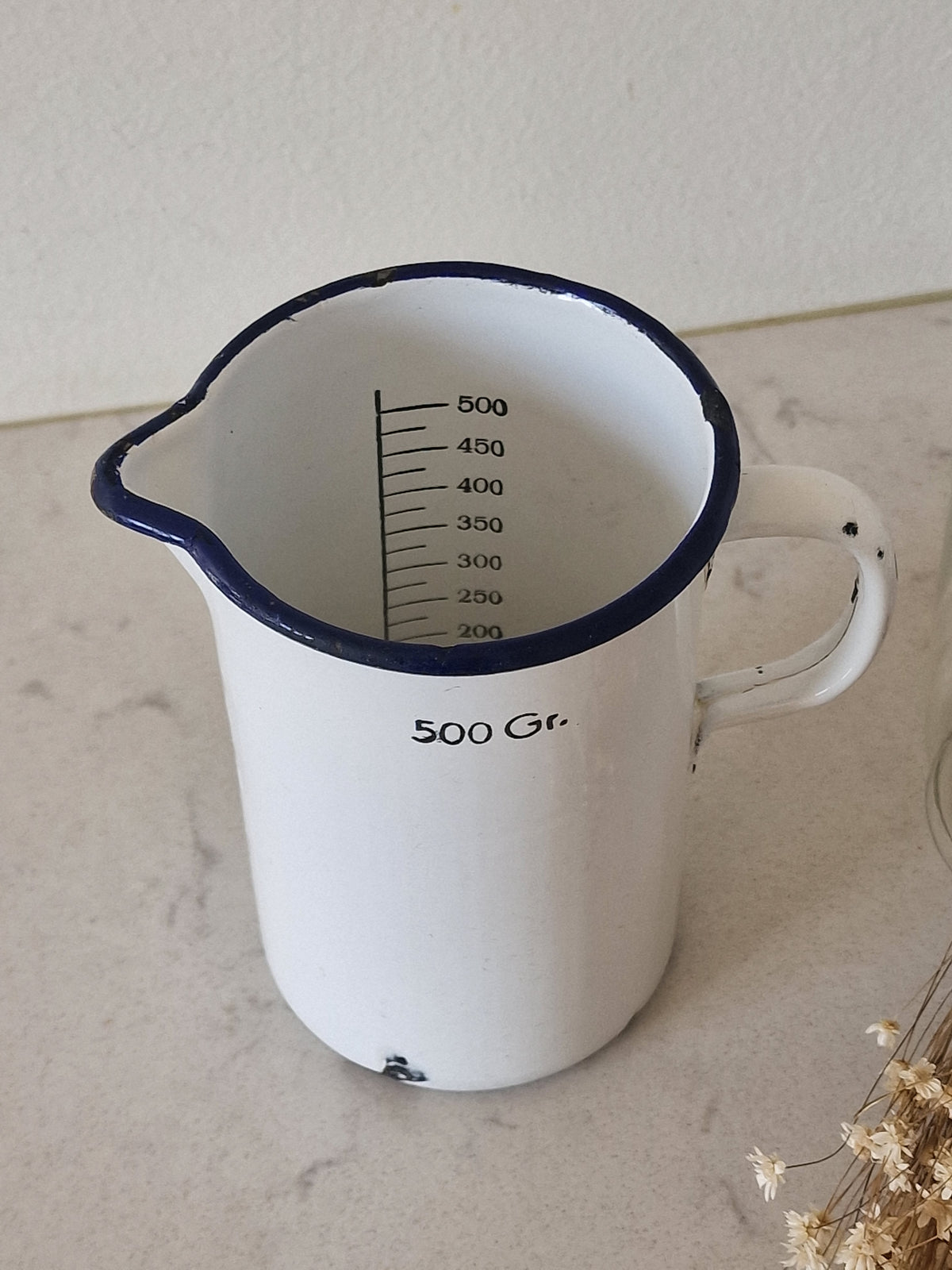 An old enamel cauldron