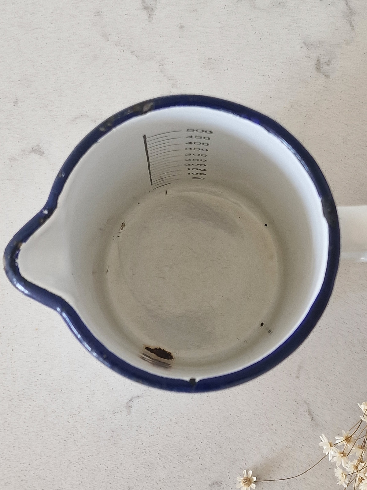 An old enamel cauldron