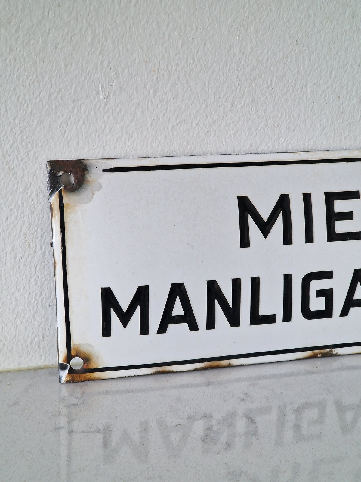 Vanha kyltti miesosasto