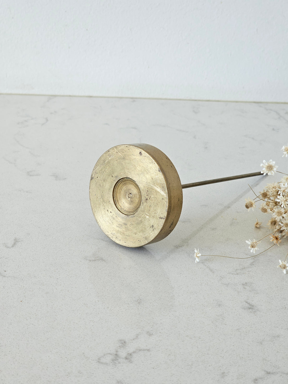 A brass spike