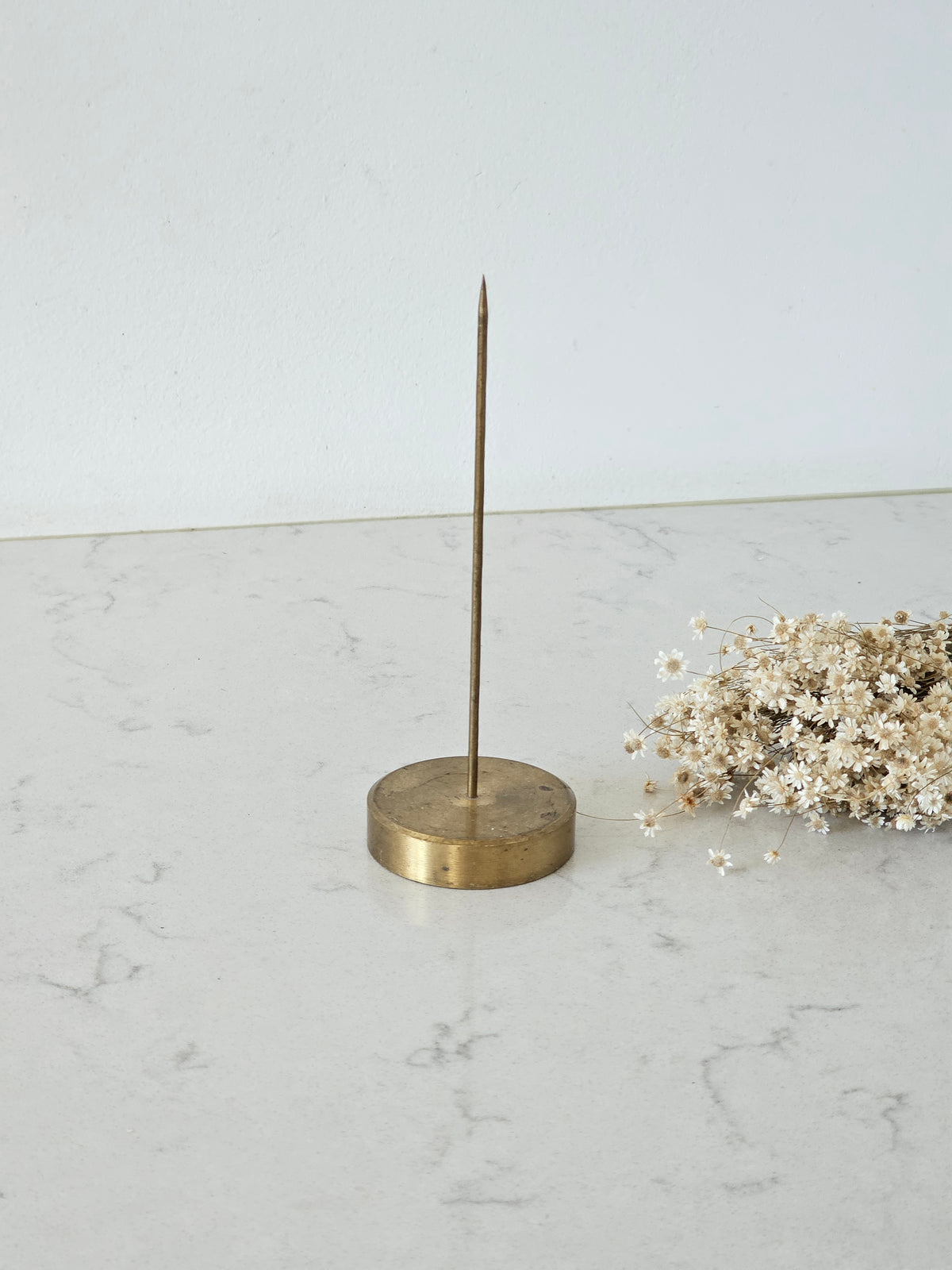 A brass spike
