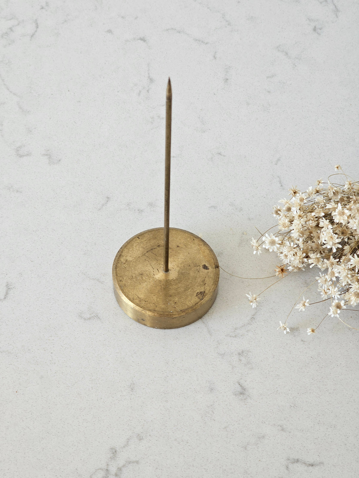 A brass spike